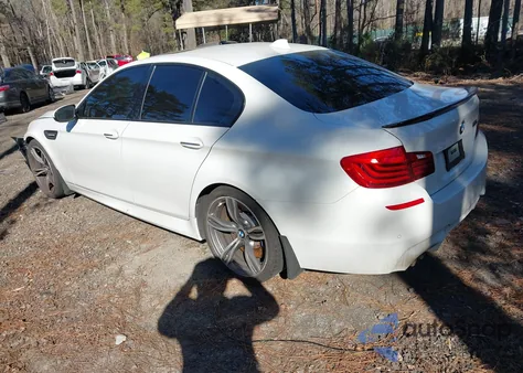 2016 BMW M5 z USA, uszkodzony, nr VIN WBSFV9C52GD595775